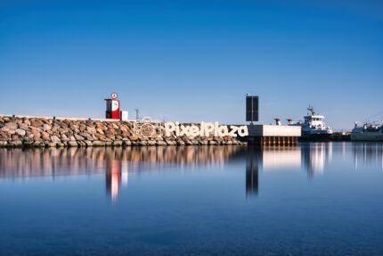 Serene Harbor Scene with Calm Reflections